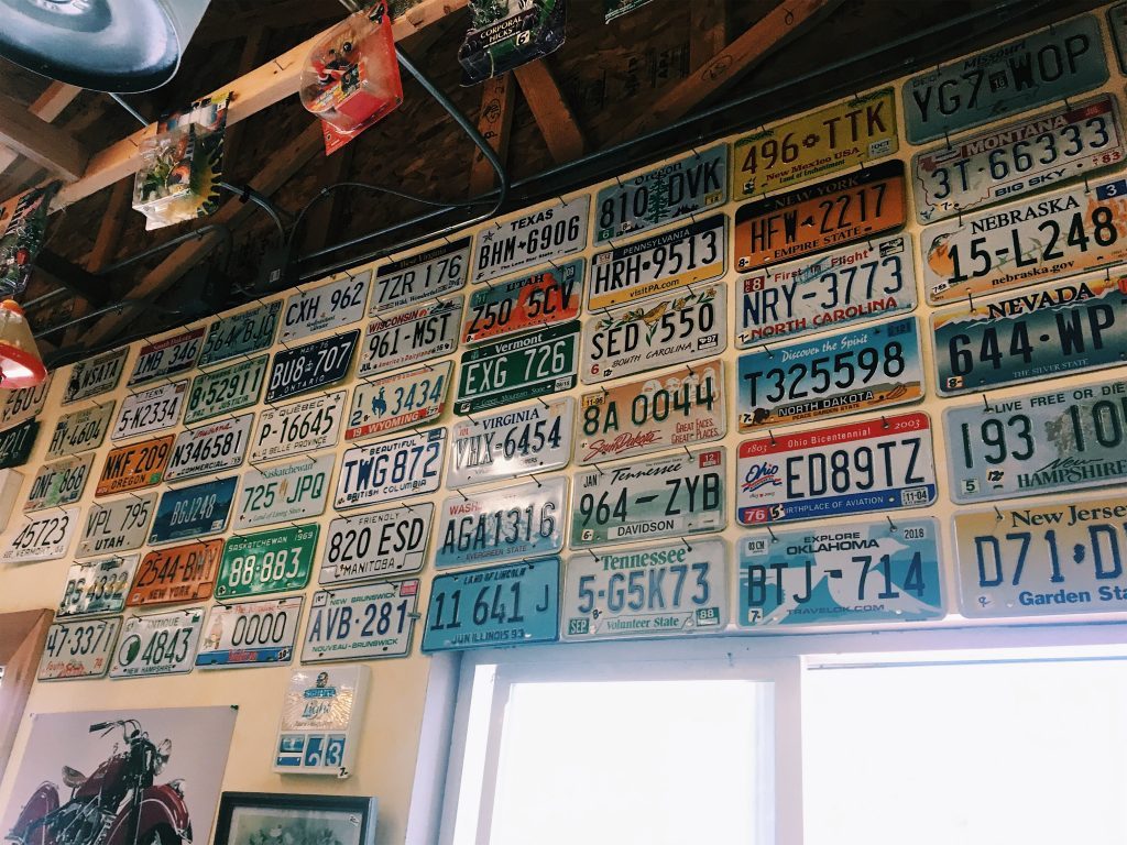 usa licence plates on a wall